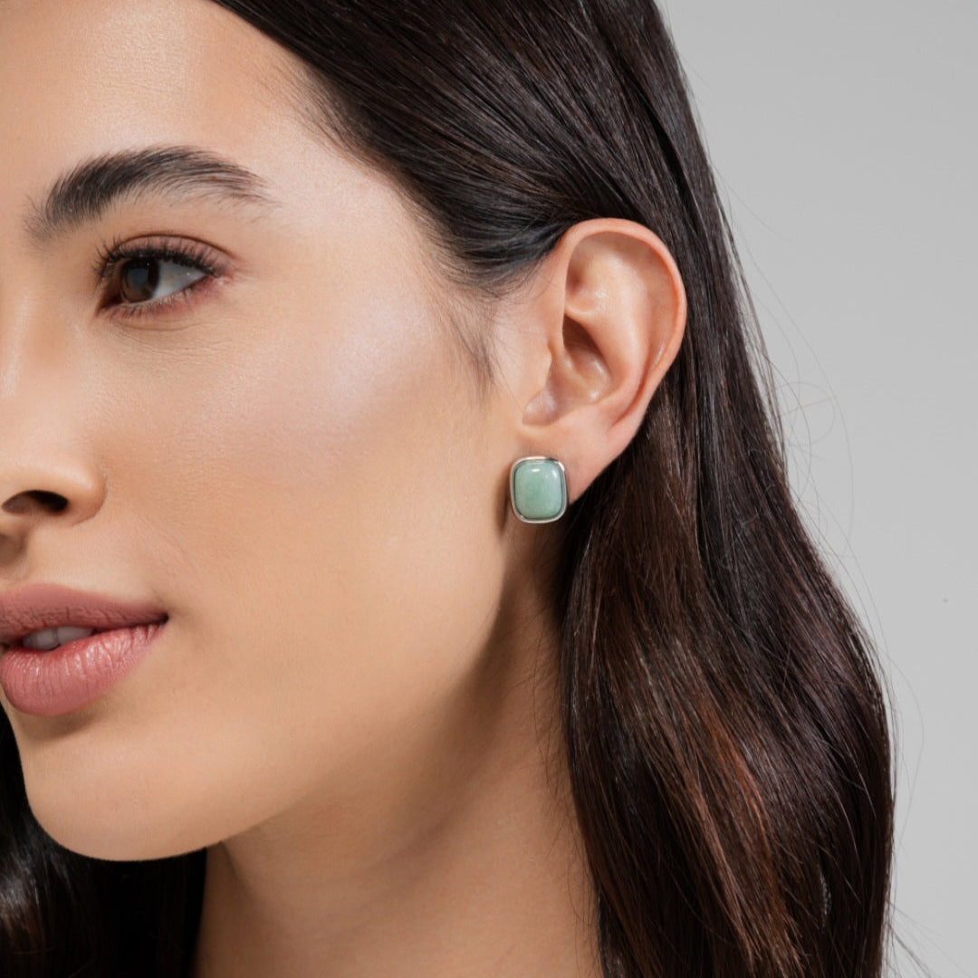 green stone silver earrings